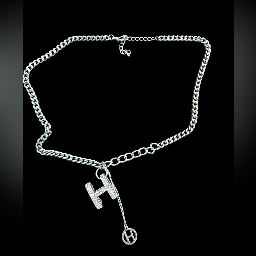 Silver tone H necklace